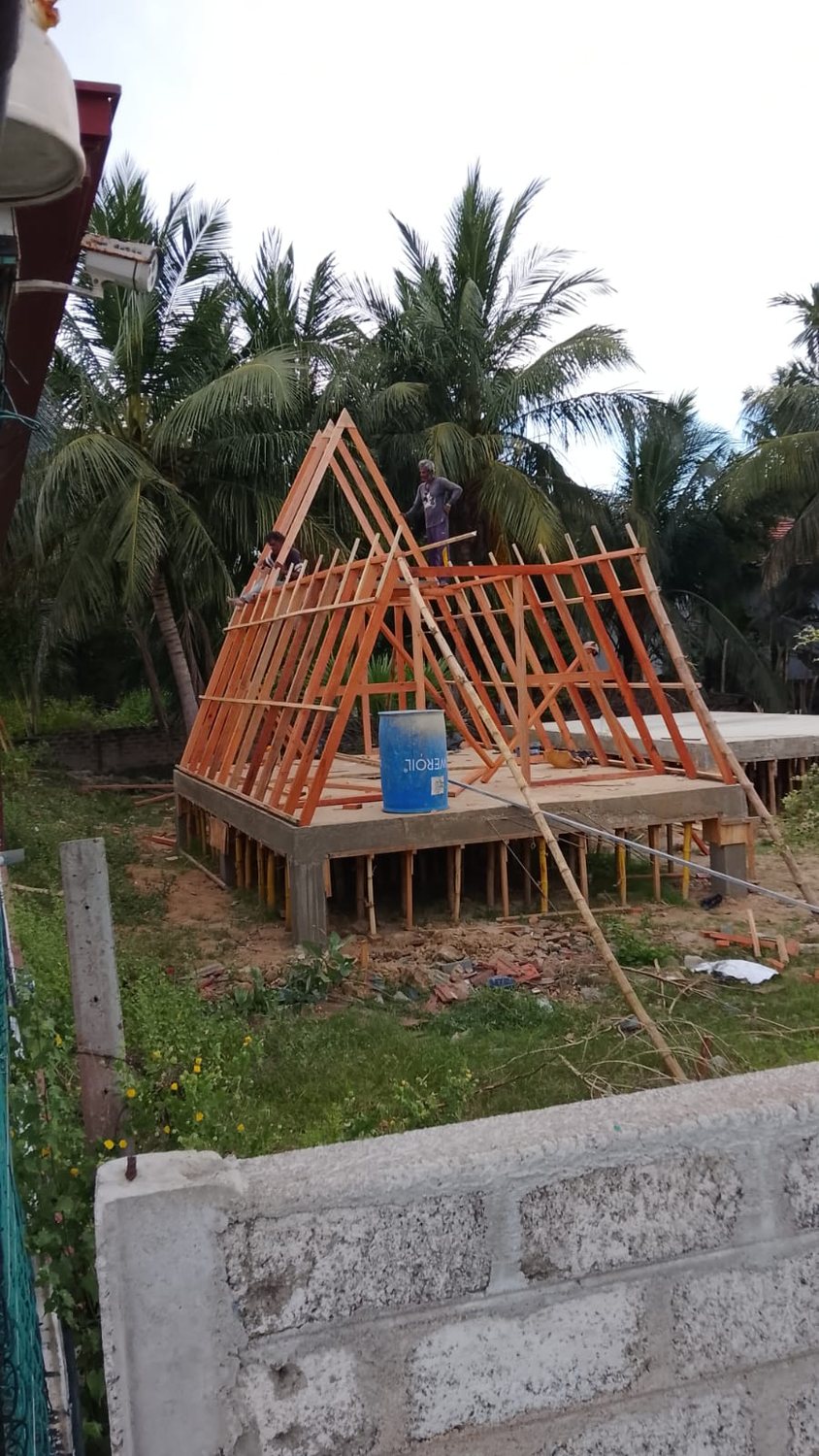Roof cladding installation on A-frame